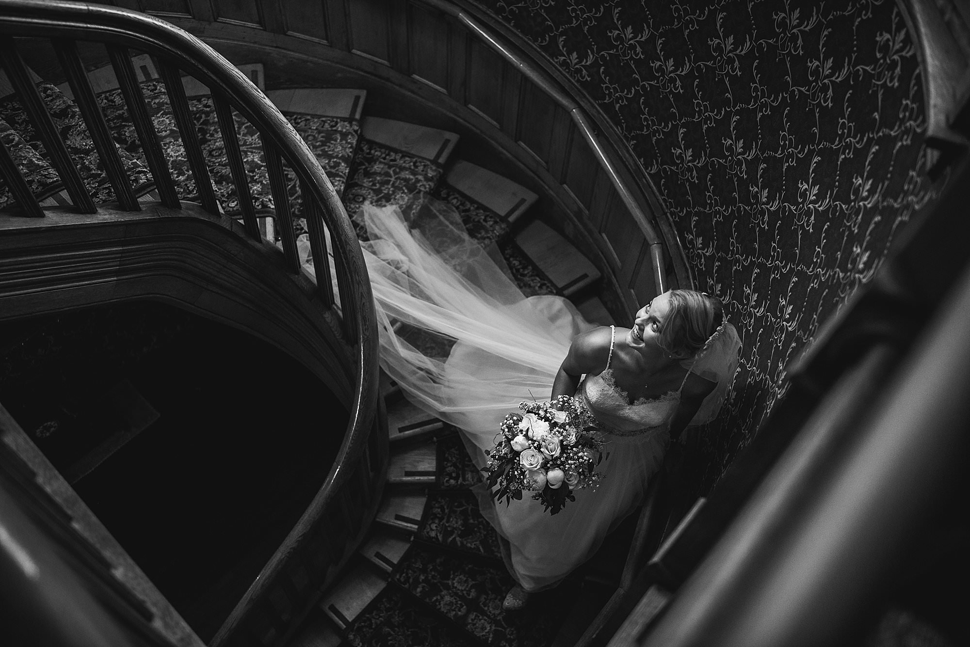 bride on staircase at Ivinson Mansion